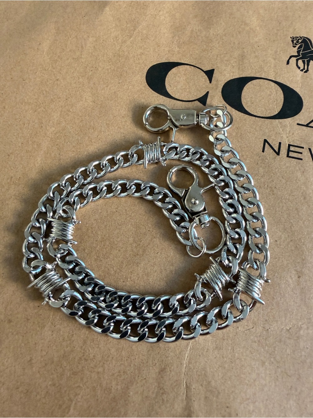 barbed wire wallet chain features a bold, industrial design New 26 inches long